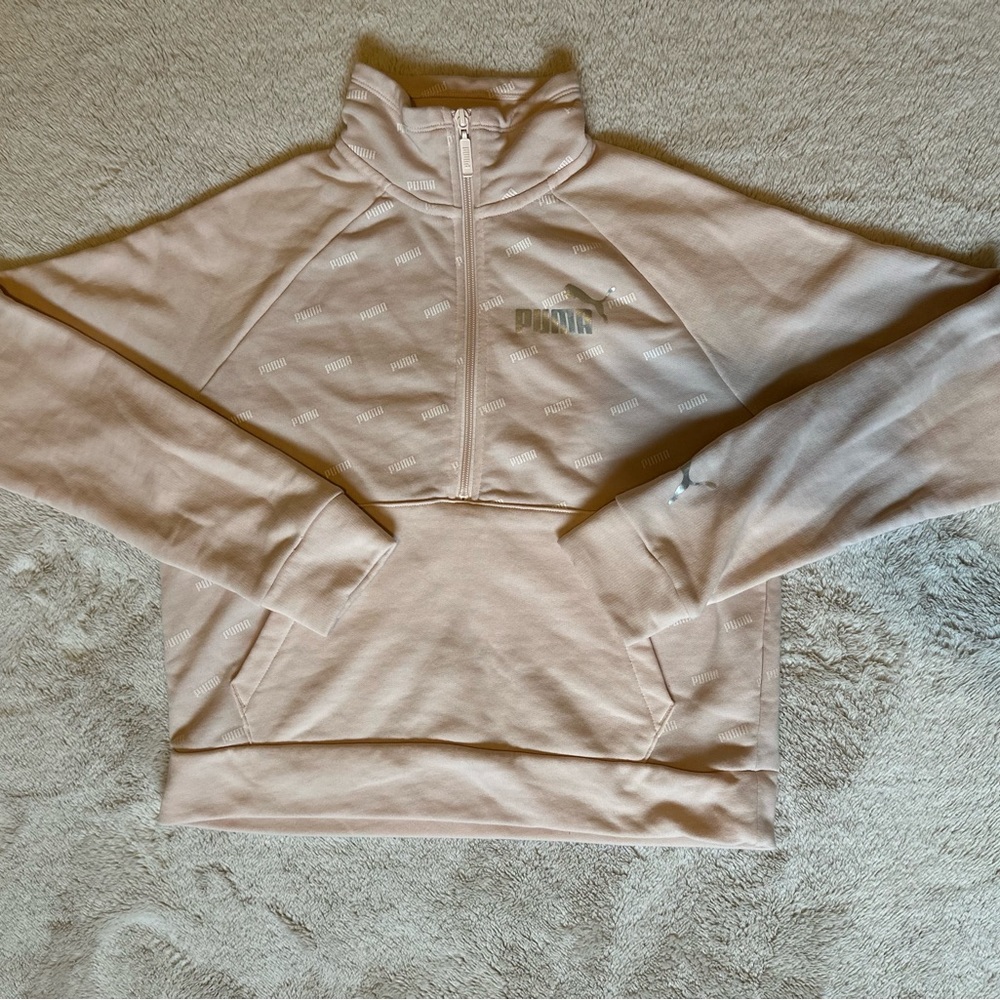 Puma 1/4 zip Pullover. Pre owned. Very small stain on left front shoulder